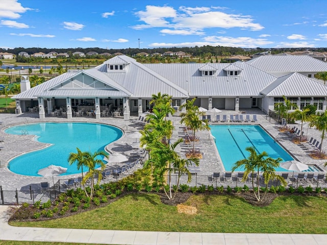 view of swimming pool with a patio