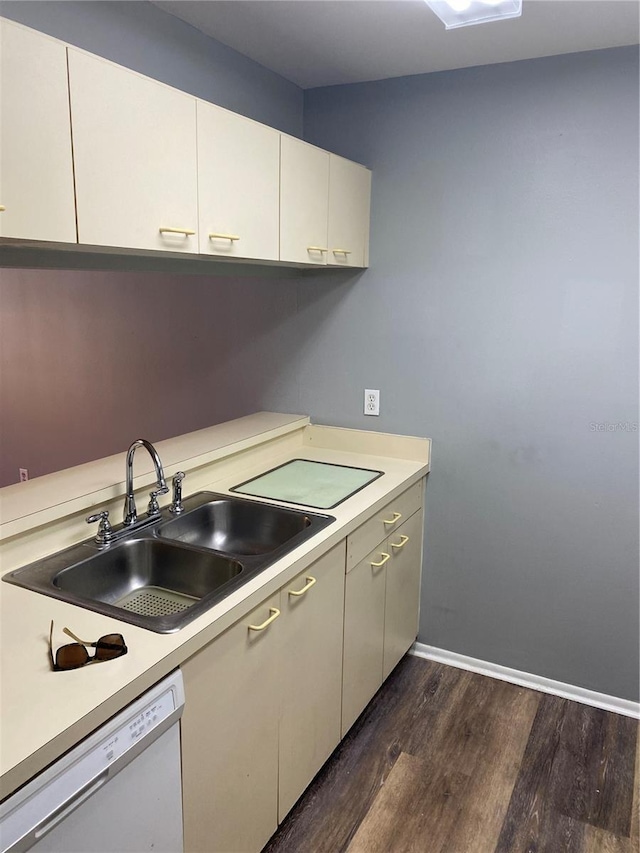 kitchen featuring white cabinetry, dishwasher, sink, and dark hardwood / wood-style floors