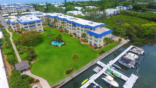 birds eye view of property featuring a water view