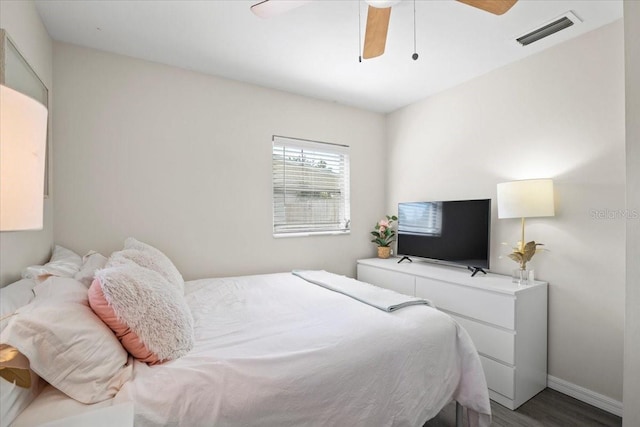 bedroom featuring hardwood / wood-style floors and ceiling fan