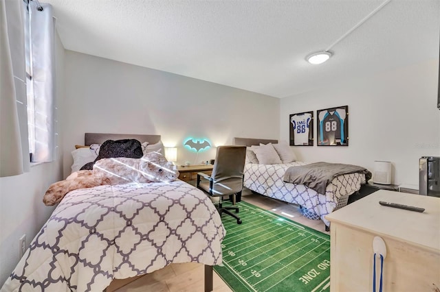 bedroom featuring a textured ceiling