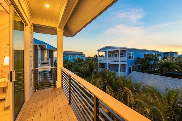 view of balcony at dusk