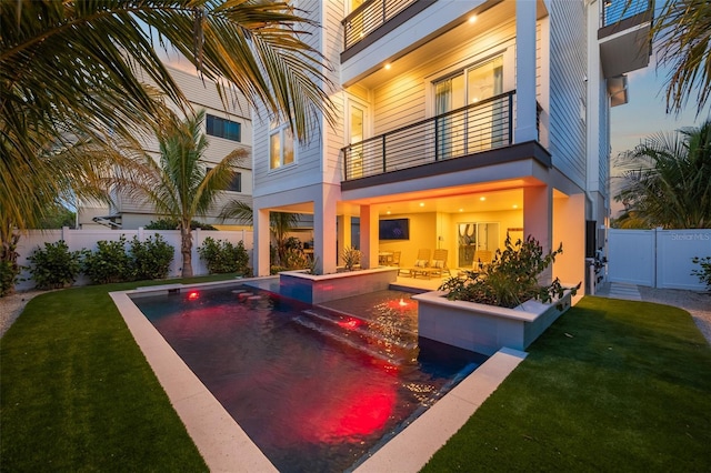 view of pool with an outdoor hangout area, a yard, and a patio