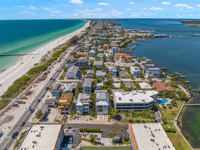 bird's eye view with a water view and a view of the beach