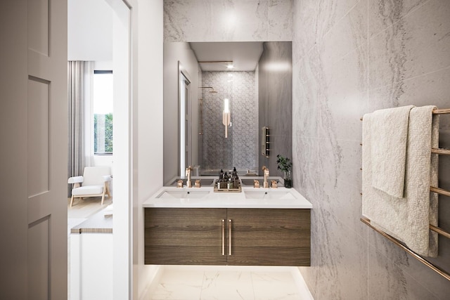 bathroom featuring vanity and tile walls