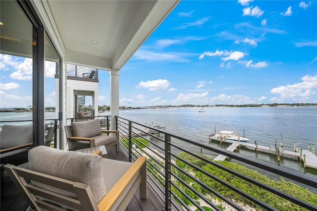 balcony featuring a water view