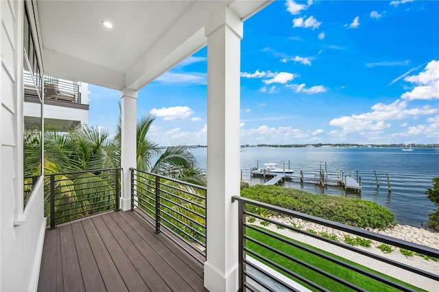 balcony featuring a water view