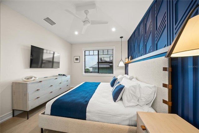 bedroom with ceiling fan and light hardwood / wood-style flooring