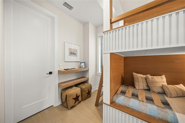 bedroom featuring light wood-type flooring