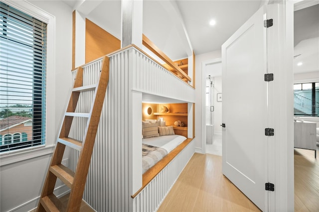 bedroom with light hardwood / wood-style floors