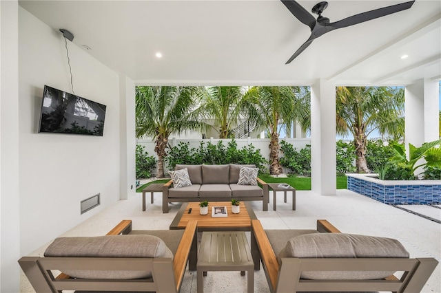 view of patio featuring outdoor lounge area and ceiling fan