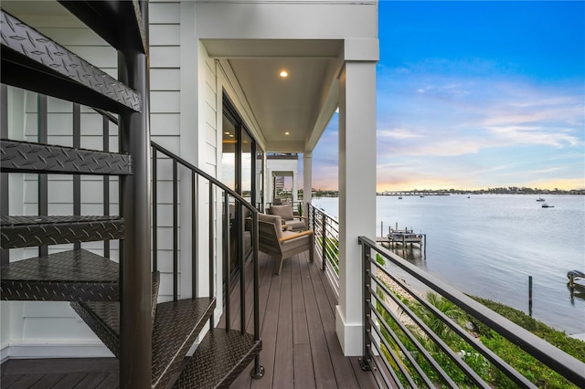 balcony at dusk with a water view