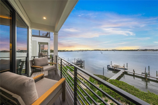 balcony at dusk with a water view