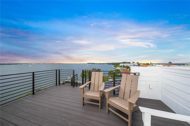 deck at dusk with a water view