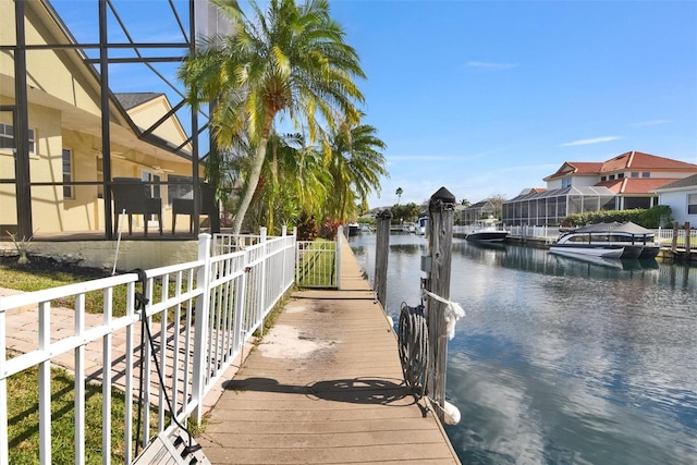 dock area with a water view