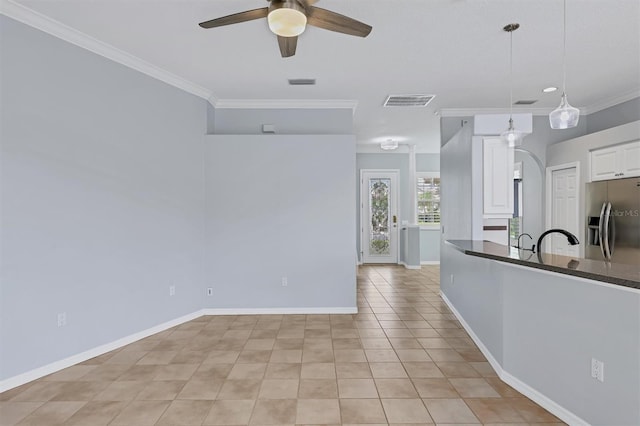 4708 Clipper Dr, Bradenton, FL 34208 - kitchen featuring dark countertops, stainless steel fridge with ice dispenser, white cabinetry, visible vents, and ceiling fan