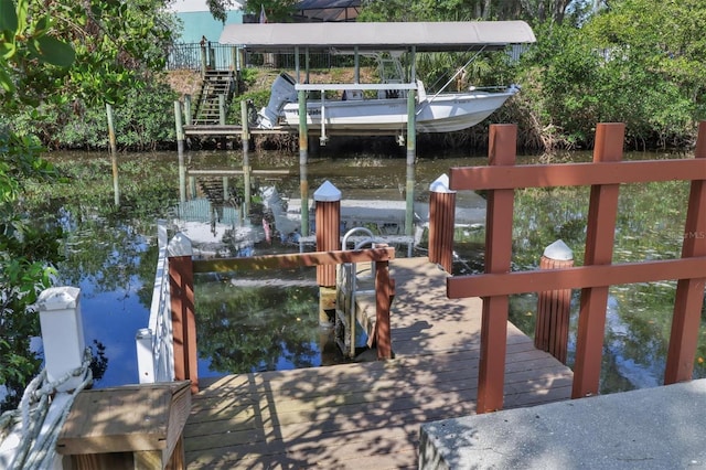 4708 Clipper Dr, Bradenton, FL 34208 - dock area featuring a water view and stairway