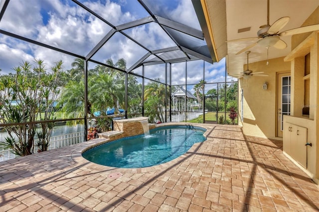 4708 Clipper Dr, Bradenton, FL 34208 - outdoor pool featuring a ceiling fan, a patio area, and glass enclosure