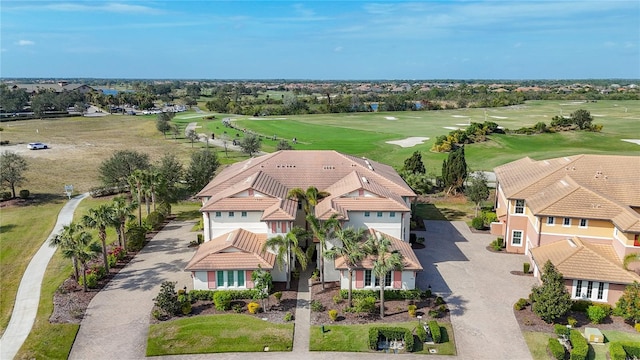 birds eye view of property featuring golf course view