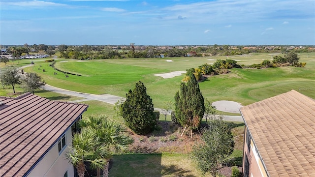 bird's eye view with view of golf course