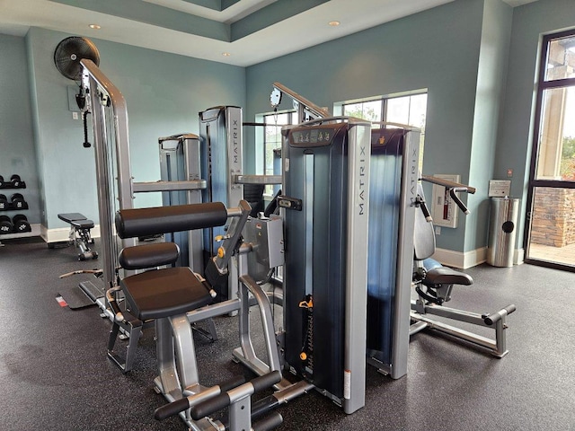 exercise room with baseboards