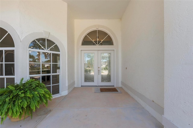 entrance to property featuring french doors