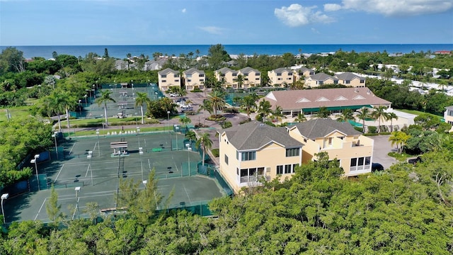 bird's eye view featuring a water view and a residential view