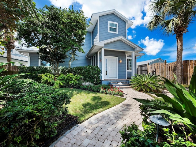 view of front of house featuring a front lawn