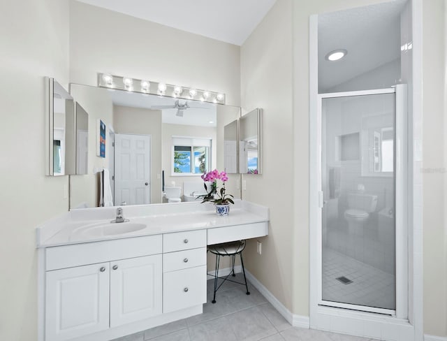 bathroom with tile patterned flooring, toilet, and an enclosed shower