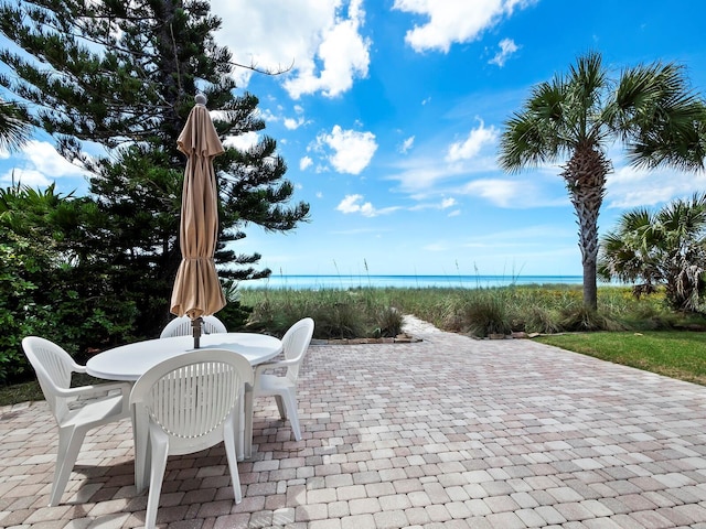 view of patio / terrace featuring a water view