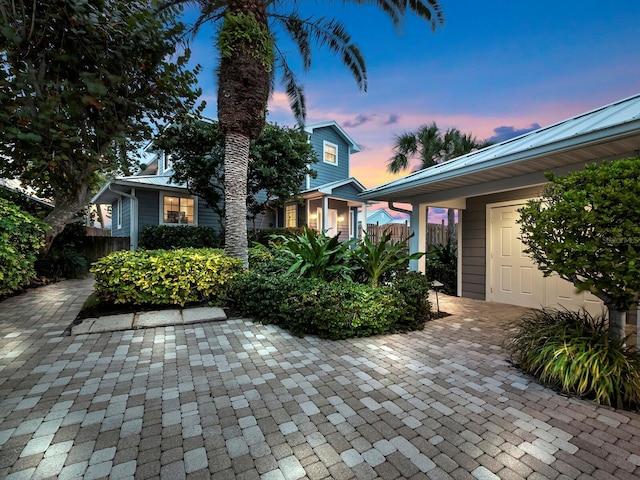 obstructed view of property featuring a patio area