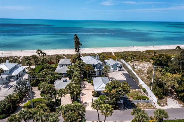 bird's eye view with a beach view and a water view