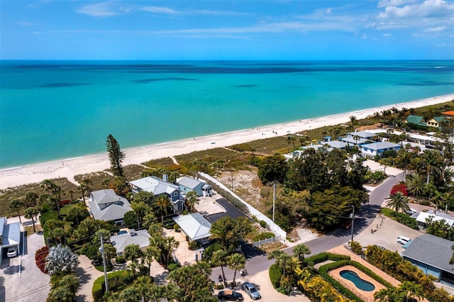 aerial view featuring a water view and a view of the beach