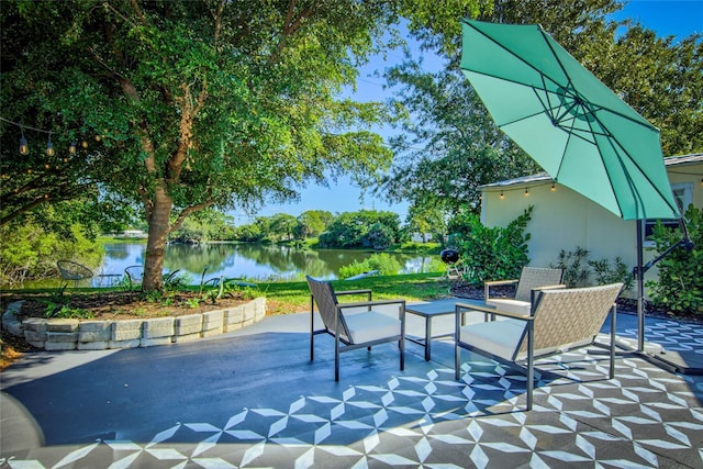 view of patio / terrace with a water view