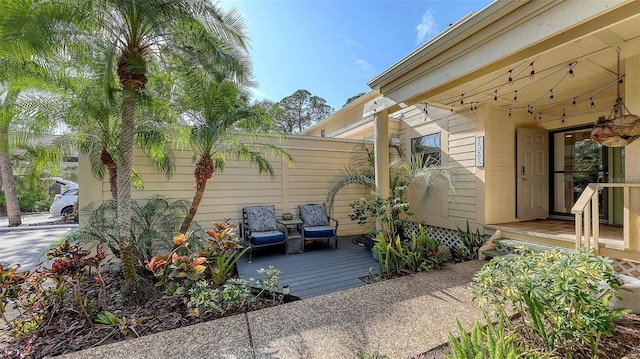 view of property exterior with a deck