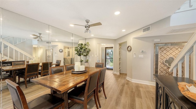 dining room with ceiling fan and light hardwood / wood-style flooring