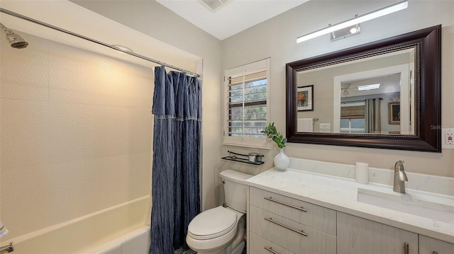 full bathroom featuring vanity, toilet, and shower / bath combo with shower curtain