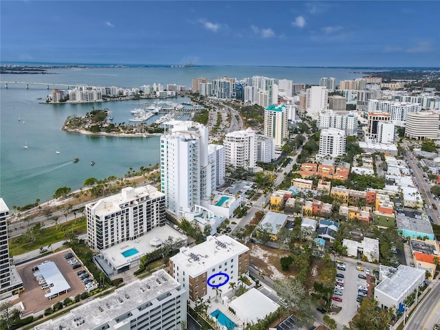 birds eye view of property featuring a water view