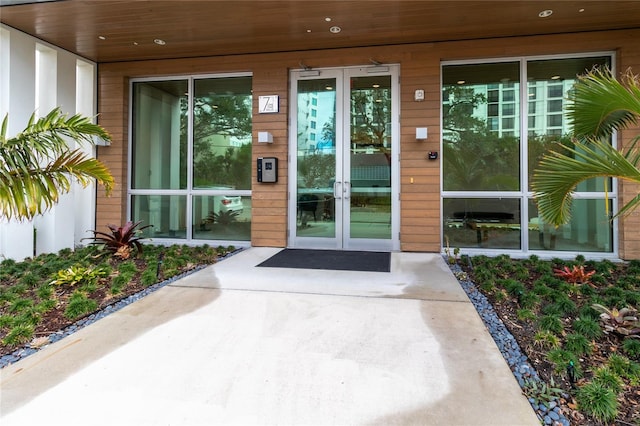 entrance to property featuring french doors