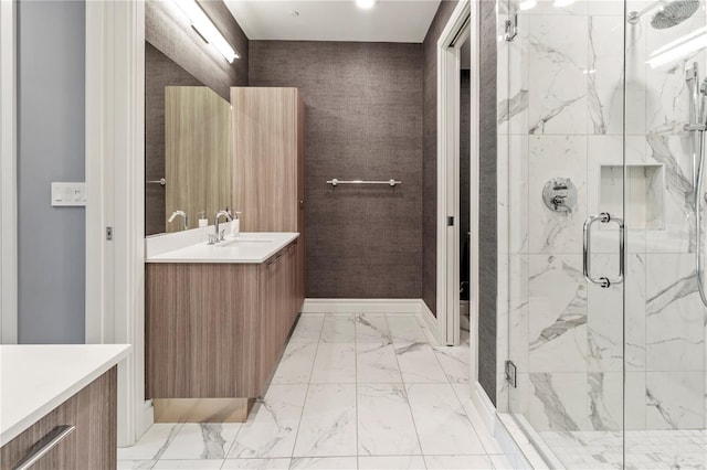 bathroom featuring walk in shower and vanity