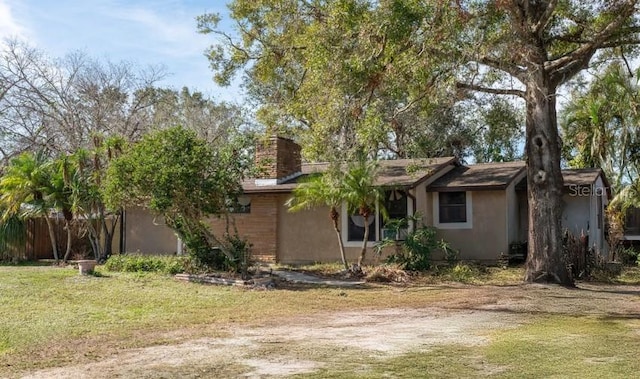 exterior space with a front lawn