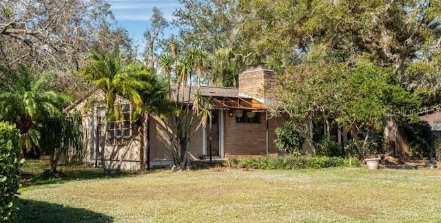 exterior space featuring a front lawn