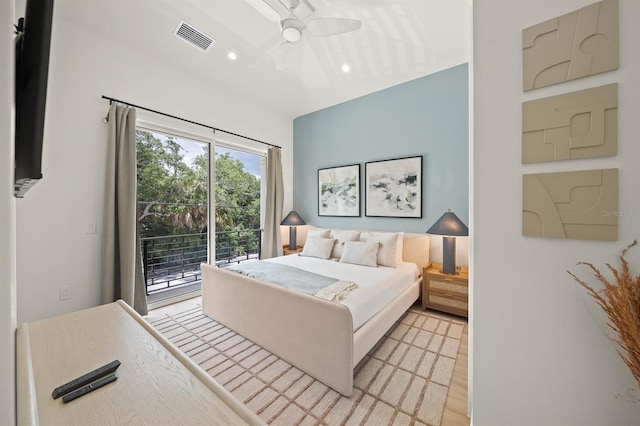 bedroom featuring access to outside, ceiling fan, and light wood-type flooring