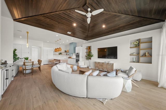 living room featuring light hardwood / wood-style flooring, ceiling fan, and wooden ceiling