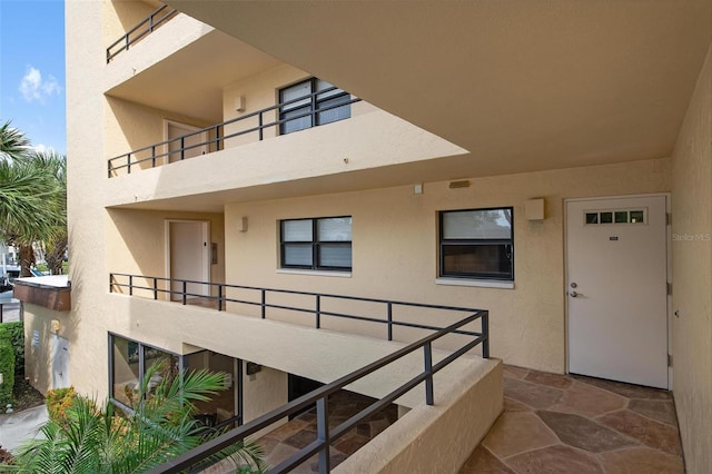 doorway to property with a balcony