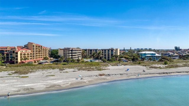 aerial view featuring a water view and a view of the beach