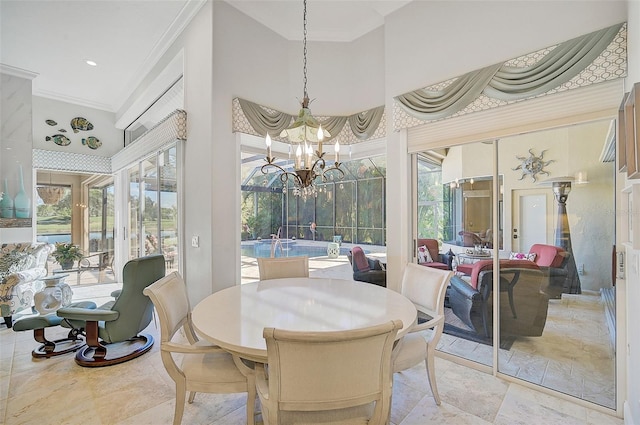 sunroom featuring an inviting chandelier