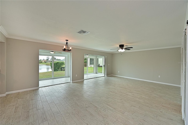 unfurnished room featuring ceiling fan with notable chandelier, light hardwood / wood-style floors, a water view, and crown molding