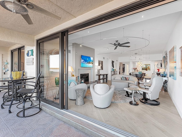 interior space featuring ceiling fan