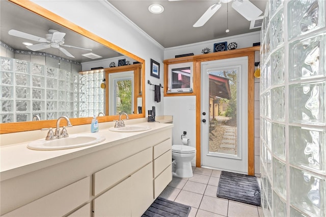 bathroom featuring ornamental molding, a wealth of natural light, tile patterned floors, and ceiling fan